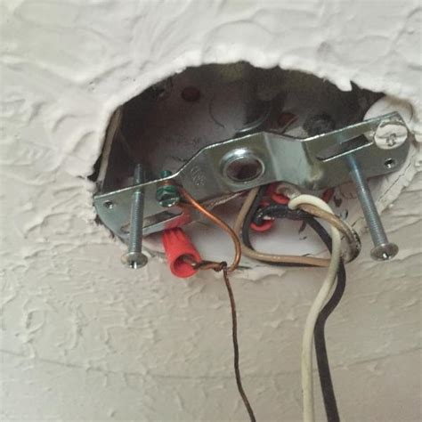 remove ceiling electrical box|loose ceiling fan electrical box.